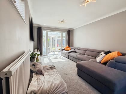 The living room, as photographed by the agent